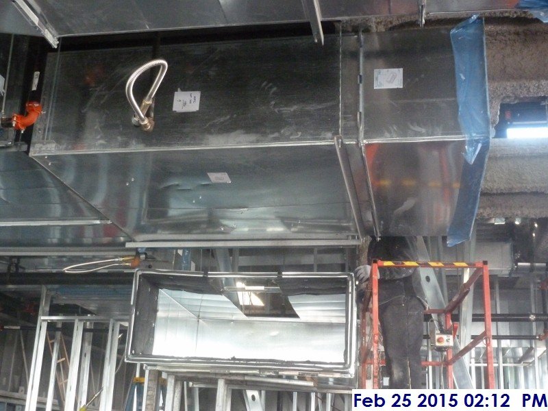 Installing duct work at the 4th floor Facing North